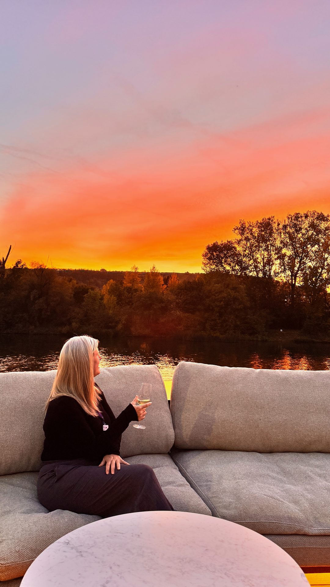 Sunset over the Main River from the sun deck lounge at the front of the APT Solara river cruise ship