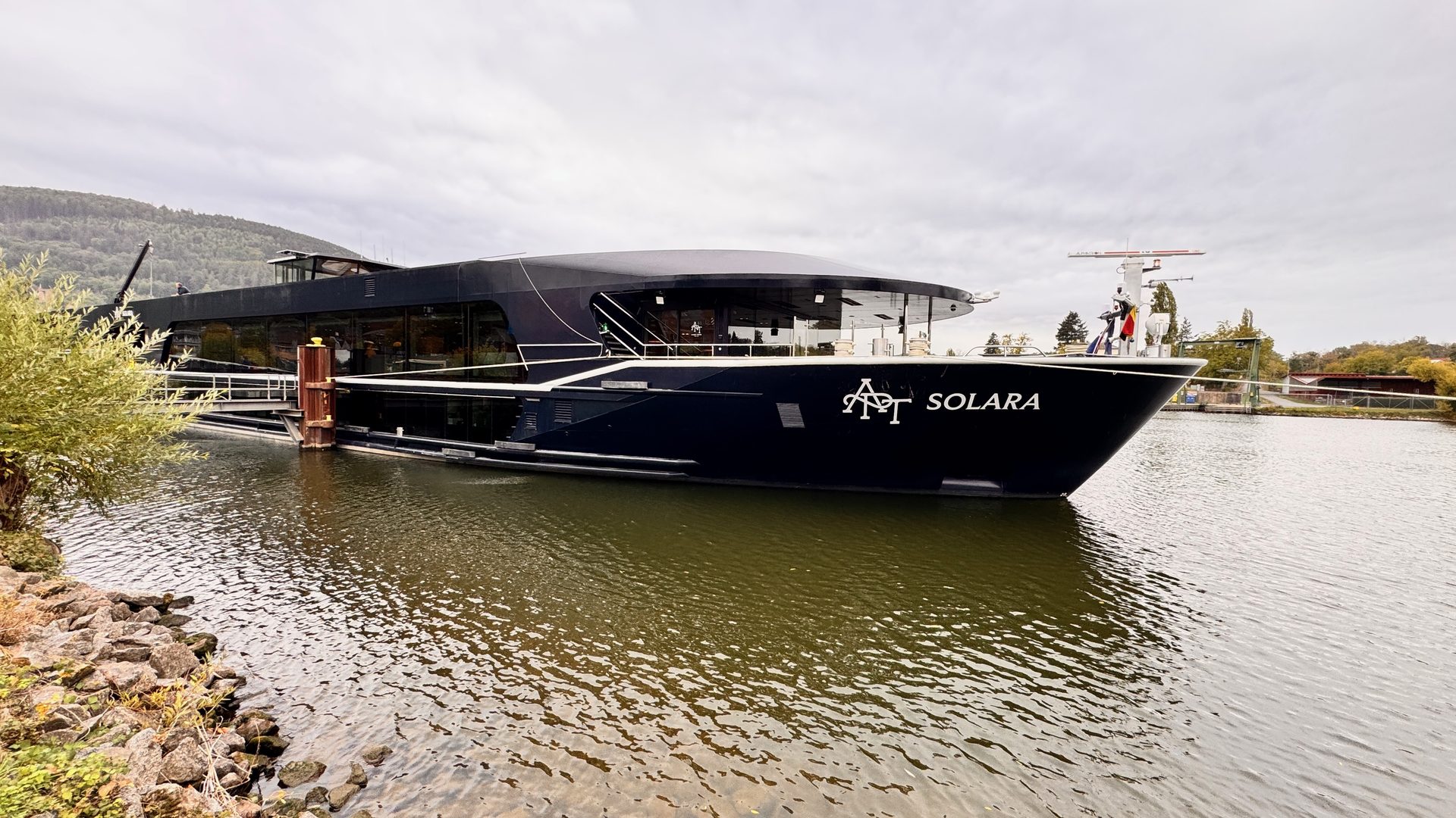 The APT Solara river cruise ship docked on the Main River in Miltenberg, Germany, reviewed by travel advisor Annie Schlegel of Suite Impressions Travel