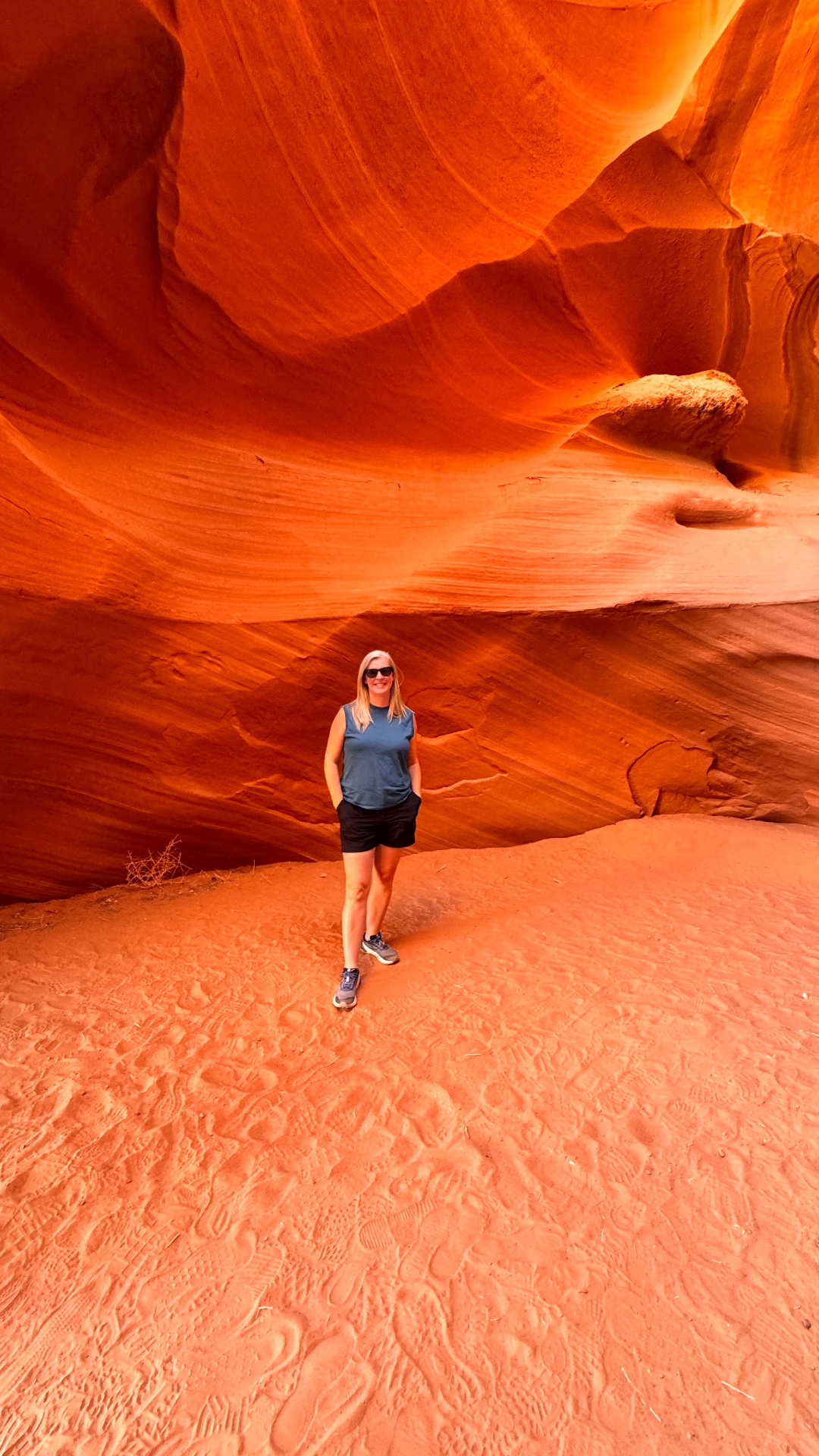 Traveler exploring the red rock formations of Antelope Canyon in Arizona