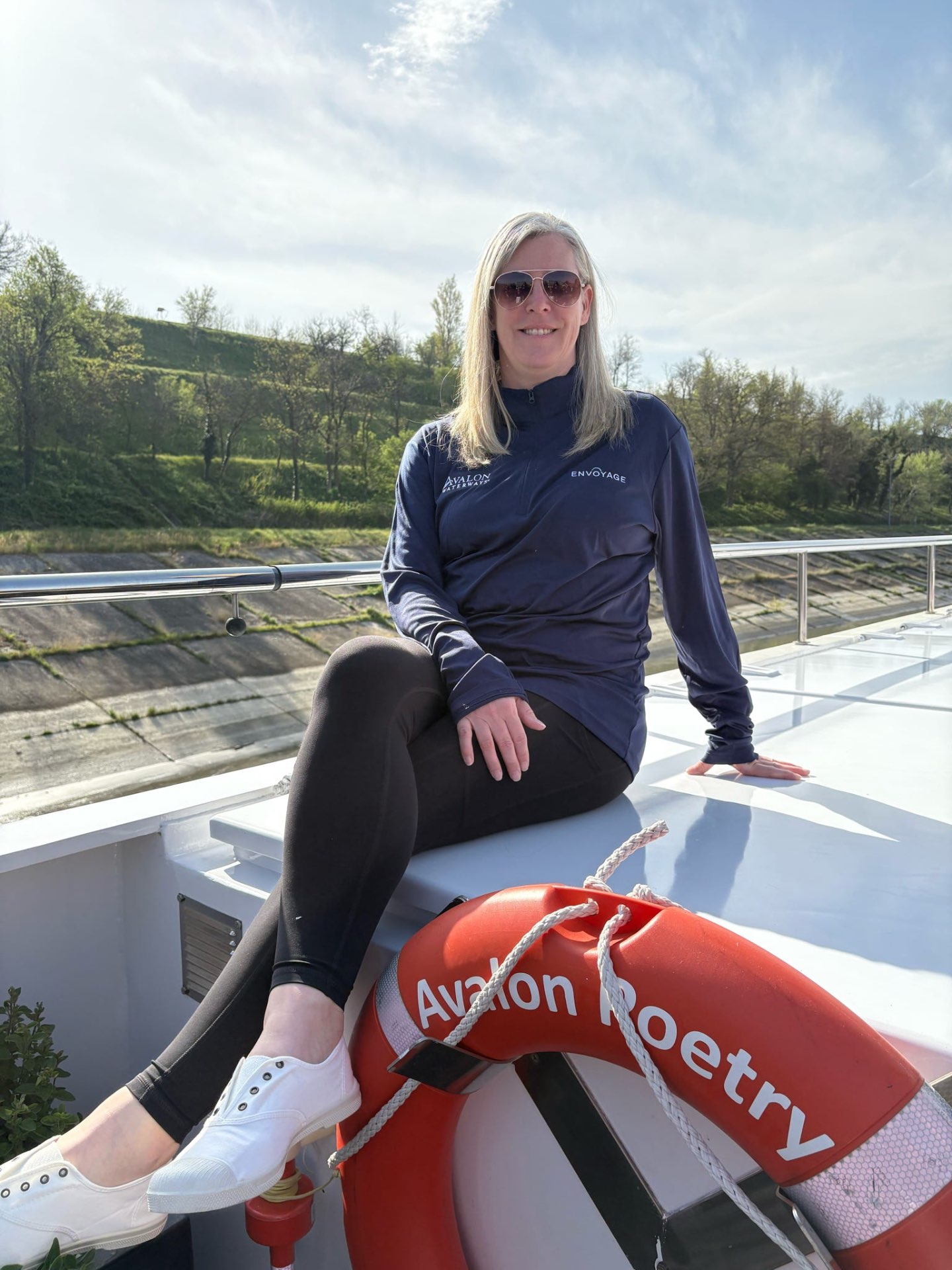 Travel advisor Annie Schlegel on a European river cruise ship with Budapest Parliament in the background